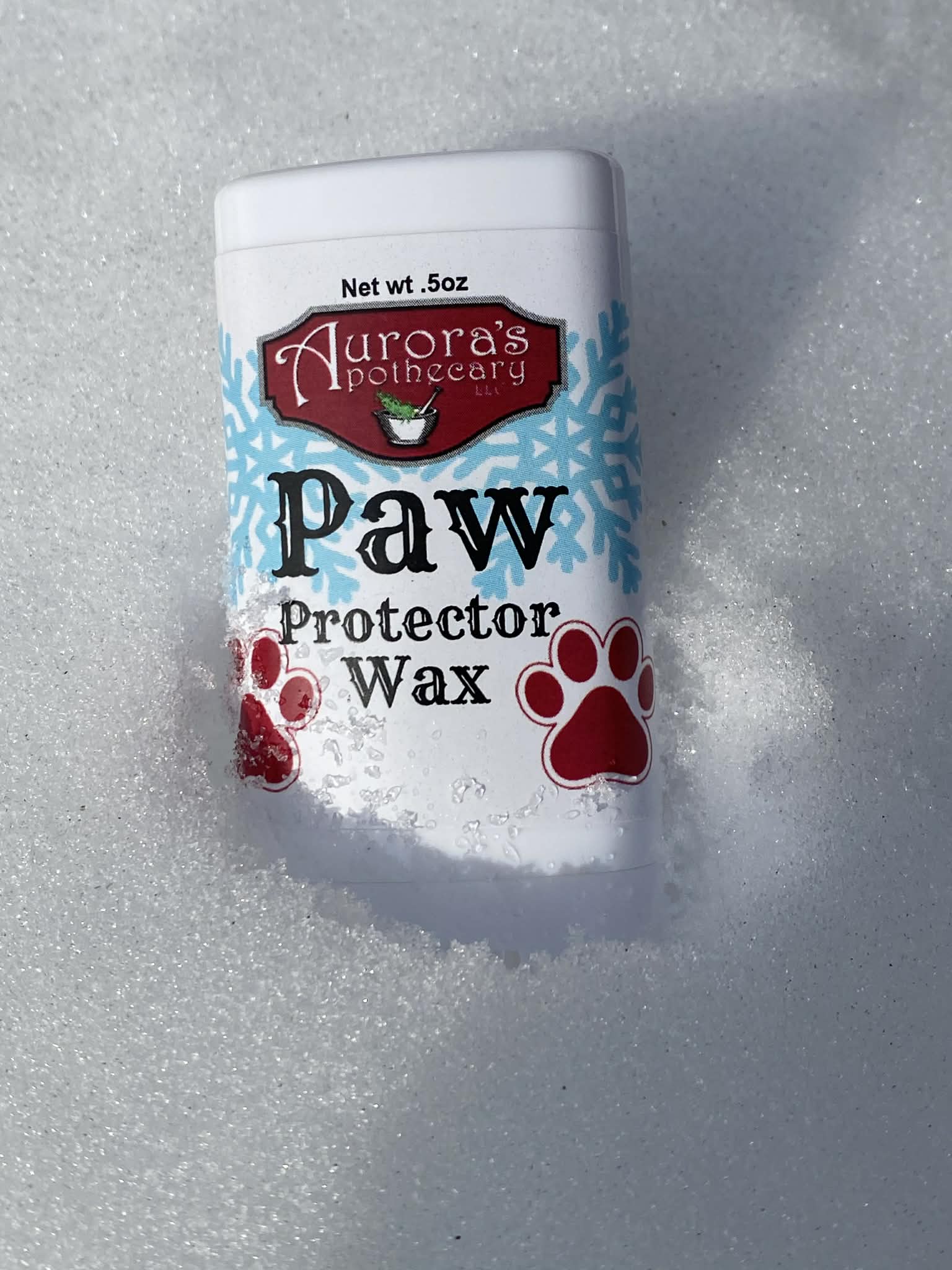 Aurora’s Apothecary Paw Protector Wax stick for dogs protecting paws from snow, salt, and hot pavement