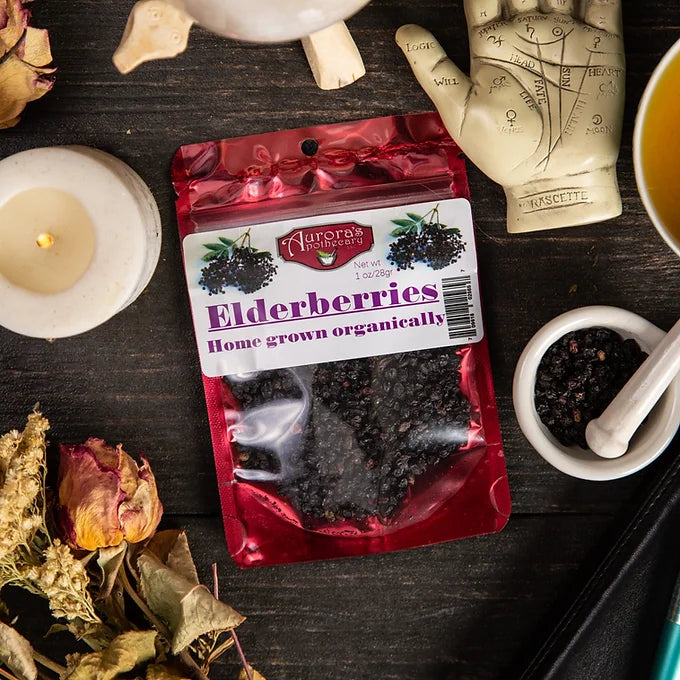 Close-up of dried elderberries in a 1 oz package, known for immune-boosting properties.